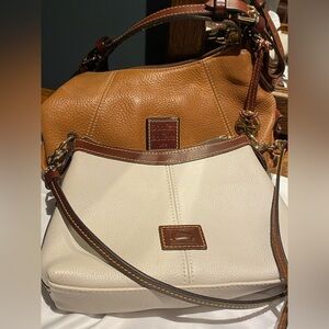 2 Dooney & Bourke bags. Leather Crossbody Bag and shoulder bag (2)